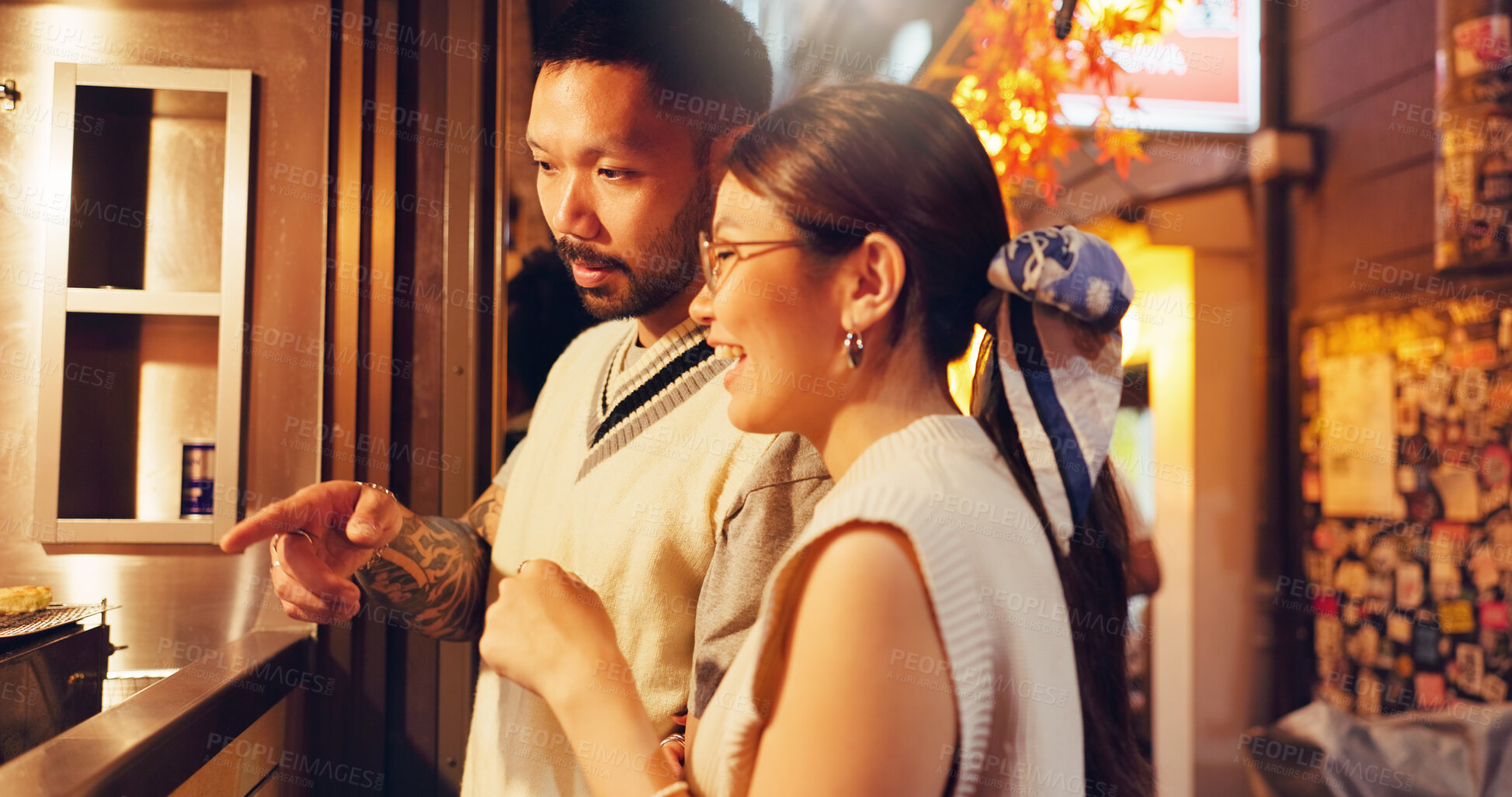 Buy stock photo Street food, choice and pointing with Japanese couple at market for culture festive, nutrition or health. Travel, shopping and cuisine with man and woman at Japan city vendor for date and holiday