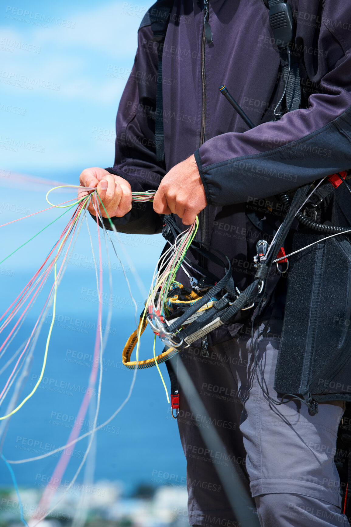 Buy stock photo Paragliding, rope and sport with hands of person in nature for flight, travel or vacation. Safety gear, holiday and trip with closeup of man and strings in outdoors for action, parasailing and cord