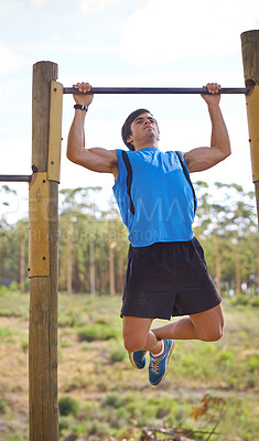 Buy stock photo Athlete, man and exercise with pull up for training, health and wellness at park. Bodybuilder, workout and cardio in nature for fitness, strong muscle and person for sports or competition or hobby