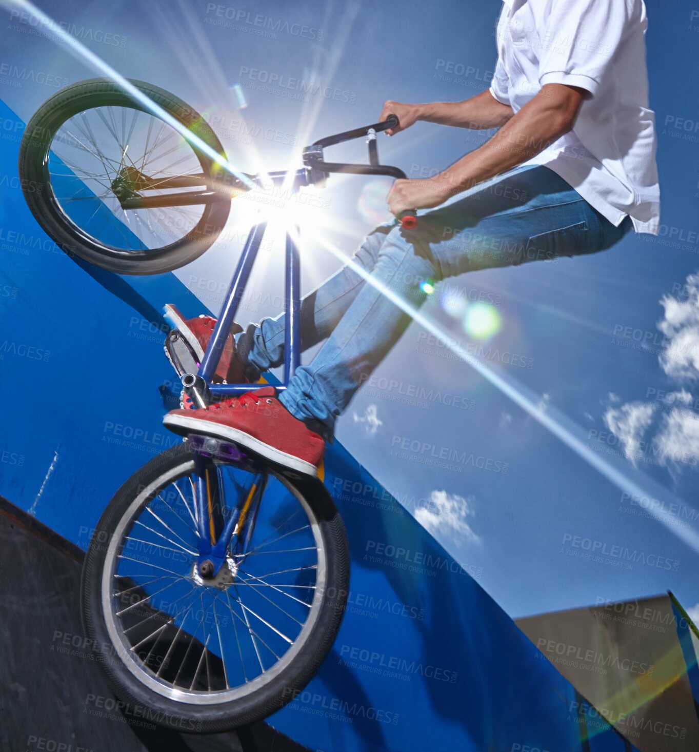 Buy stock photo Ramp, trick and man with bicycle in air at park, event or competition for sport with risk and balance. Mockup, space or person in sky with fearless stunt on bike for fun adventure or action in summer