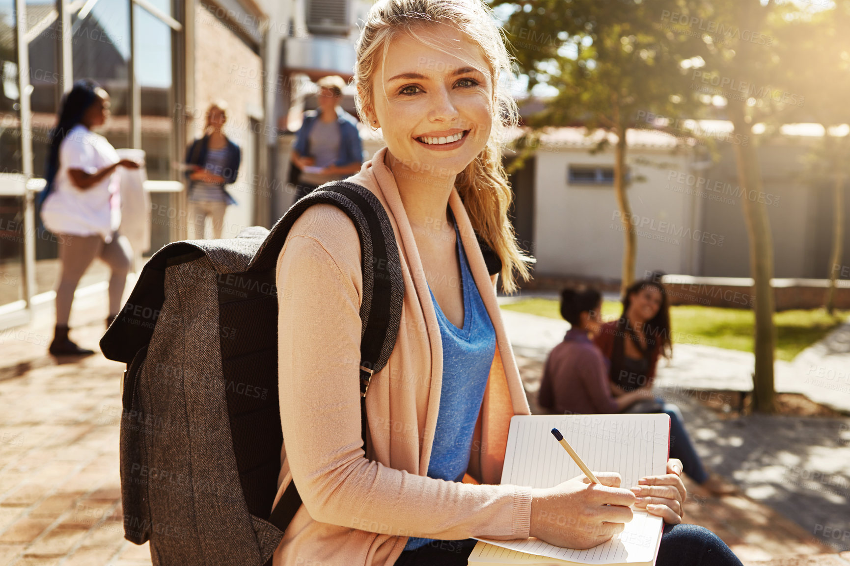 Buy stock photo Outdoor, smile and writing with woman in college for study, scholarship and school. Learning academy, happiness and knowledge with portrait of person on campus for university student, youth or future