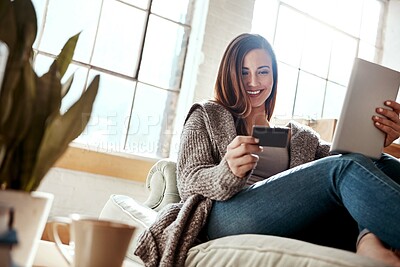 Buy stock photo Smile, tablet and credit card, happy woman on couch in living room and internet banking or fintech in home. Technology, online shopping payment and girl on sofa surfing retail website or digital shop