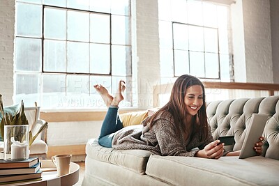 Buy stock photo Relax, tablet and credit card, happy woman on sofa in living room and internet banking or fintech in home. Technology, online shopping payment and girl on couch surfing retail website or digital shop