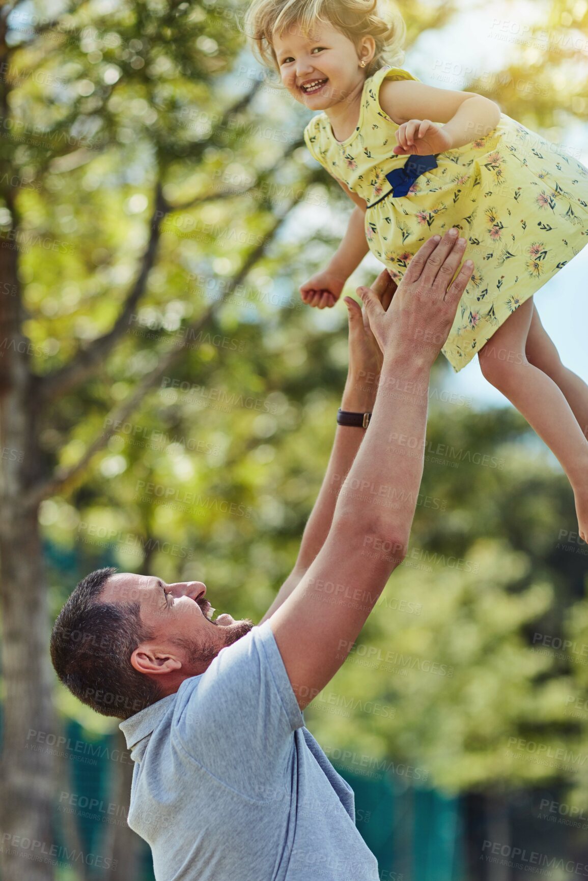 Buy stock photo Happy dad, daughter and lifting with nature for bonding, holiday or weekend together at park. Father, child or little girl with smile for love, care or support in air for fun playing or childhood