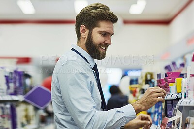 Buy stock photo Man, pharmacy and search shelves for tablets, customer and browse for antibiotics at drugstore. Male person, healthcare and aisle for medication shopping, consumer and apothecary for treatment choice