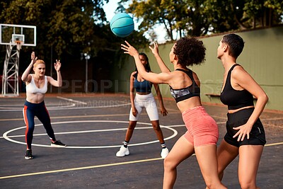 Buy stock photo Throw, basketball and women playing game together for competition, challenge and fitness on playground. Outdoor, performance and girl friends on court with ball, exercise and teamwork at sports club.