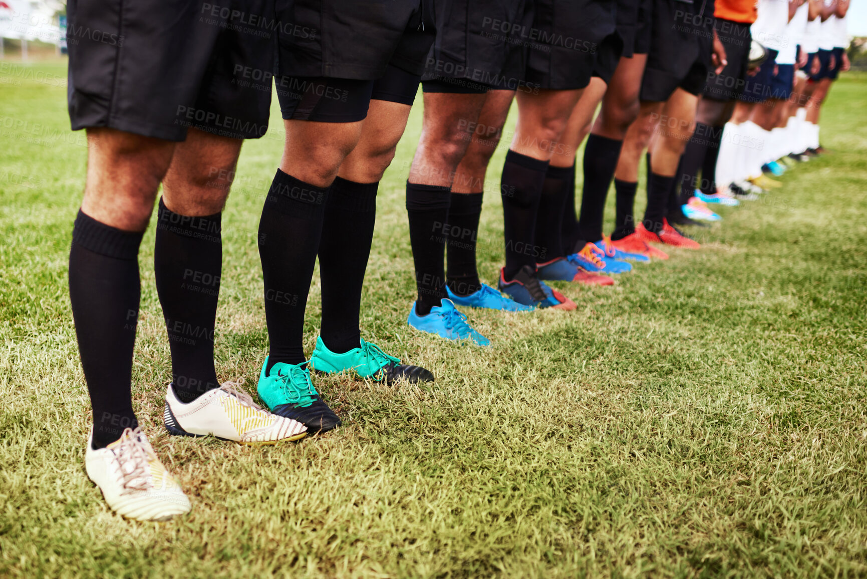 Buy stock photo Grass, line and sports with legs of rugby player team outdoor on field together for start of game. Exercise, fitness and solidarity with athlete group in row at venue for competition or tournament