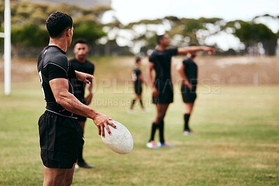 Buy stock photo Fitness, outdoor and team of rugby players at match, training or competition with opponent. Ball, sports and men athletes playing game for practice, workout or exercise of skill on field at stadium