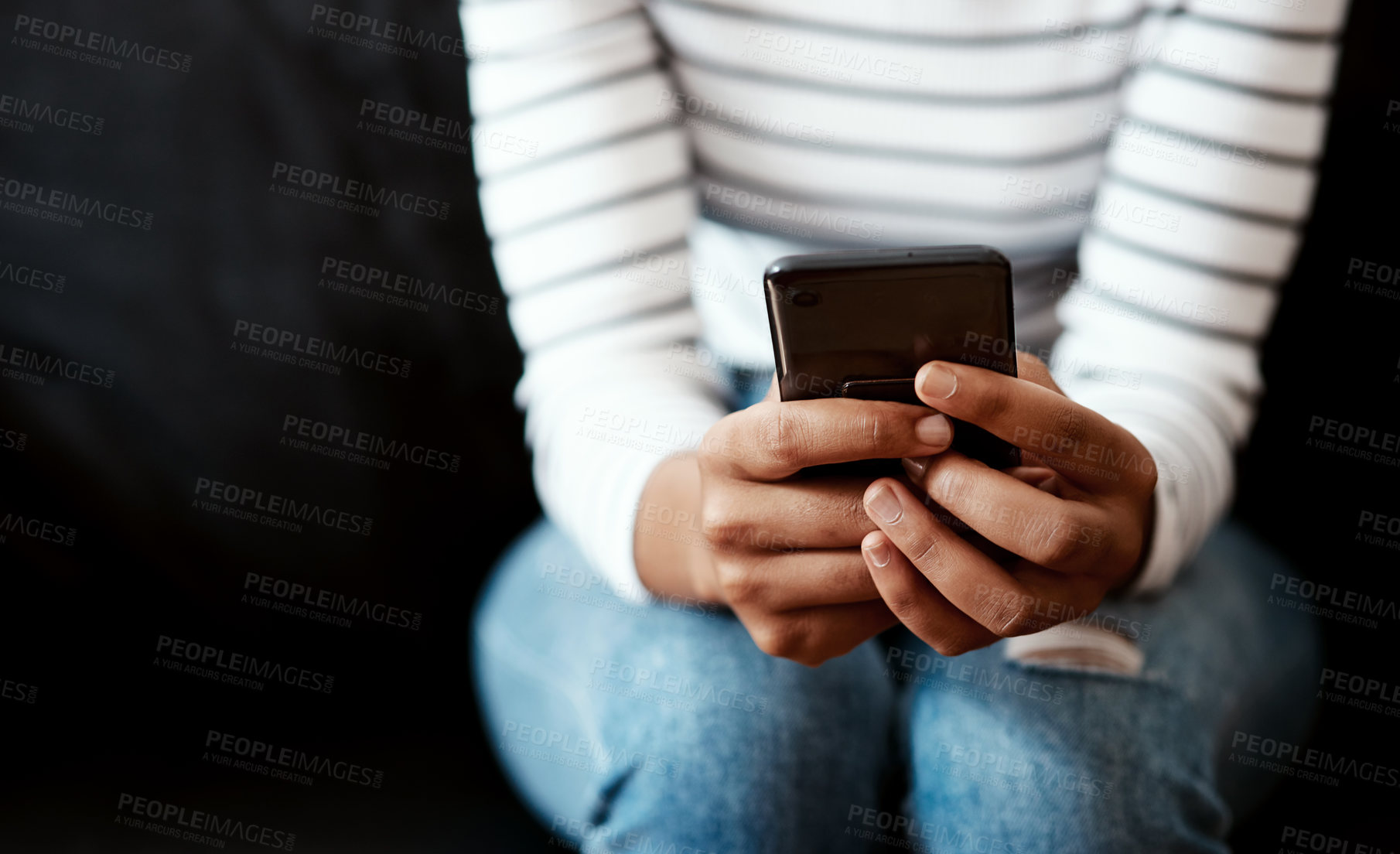 Buy stock photo Hands, woman and texting on smartphone with message or  update profile on social media in dark background. Closeup, female person and internet connection for website access and email notification