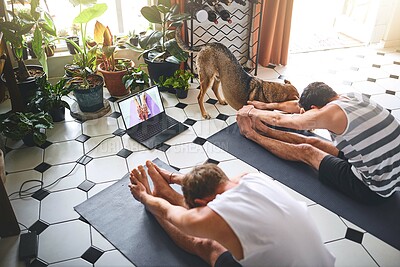 Buy stock photo Men, fitness and stretching with laptop screen for tutorial, yoga lesson or online streaming at home. Male people, friends and pilates with warm up or computer for healthy guide or exercise on mat