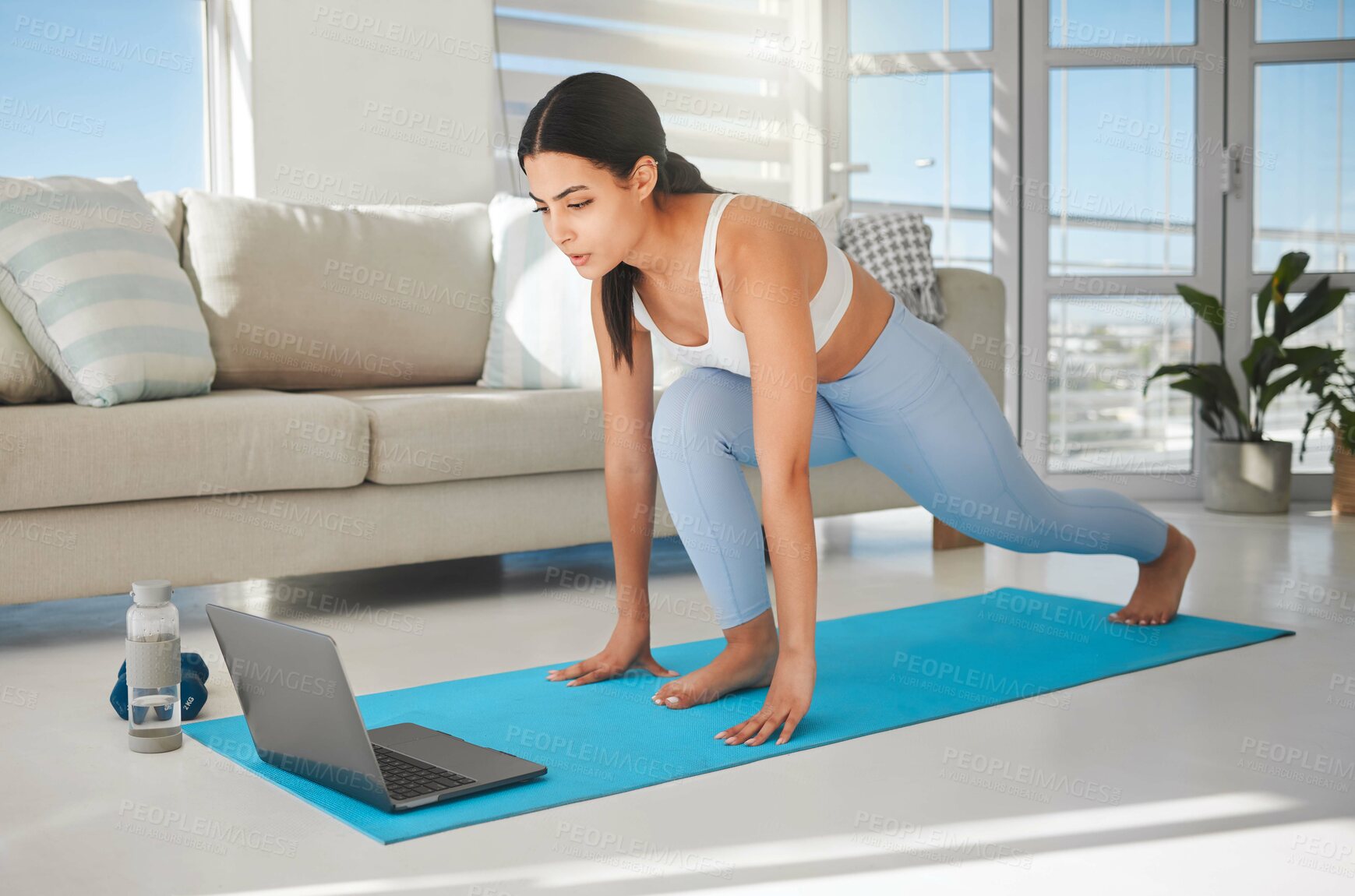 Buy stock photo Laptop, training and fitness with woman in living room for health, balance and online workout. Wellness exercise, strong and virtual class with person and home gym for streaming, body and lunge