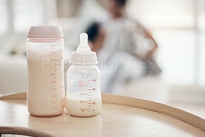 Buy stock photo Bottle, milk and baby nutrition in home, liquid food and container for minerals or vitamins. Beverage, healthy supplement and formula for child development in nursery, calcium drink and wellness