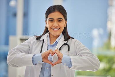 Buy stock photo Doctor, heart hands and portrait of woman in hospital with support, kindness and trust in healthcare. Health care, insurance and female medical professional with love hand gesture or emoji in clinic.