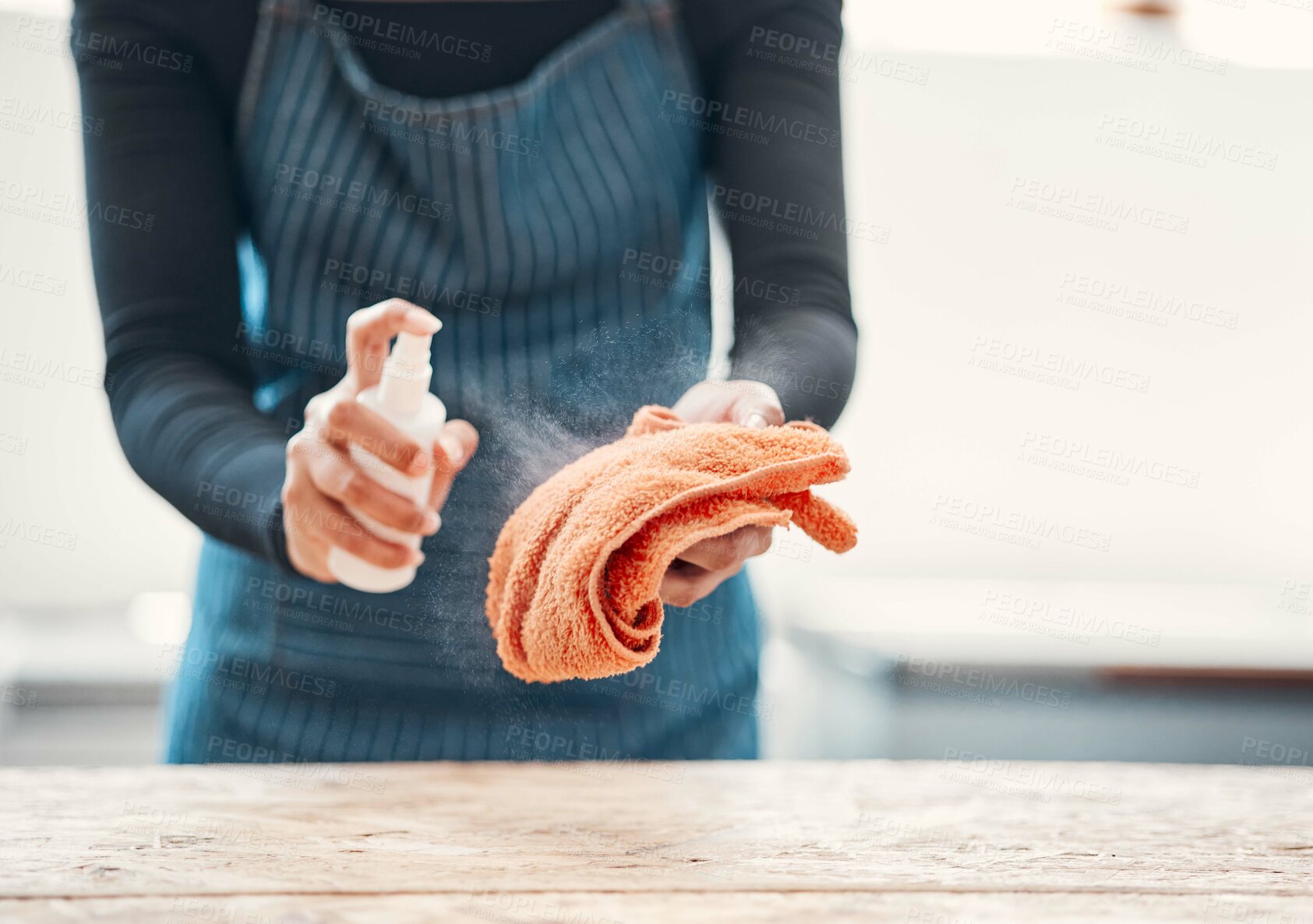 Buy stock photo Cleaning, sanitizer and spray with hands of person and cloth in cafe for bacteria, germs and dust. Safety, dirt and furniture with closeup of waitress in restaurant for virus, disinfection or cleaner