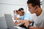 Studying, notebook and laptop with students in university classroom, library or workspace for learning, education and exam. Young college people writing lecture notes, research and digital technology