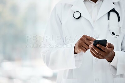 Buy stock photo Phone, hand and doctor browsing social media online using wifi in a medical hospital for research. Analysis, cellphone and typing text for contact in healthcare clinic with the hands of a gp 