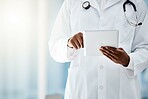 Doctor, hands and tablet in hospital office for online consultation or telehealth app. Research, healthcare and black female physician on touchscreen tech, medical news or checking patient records.