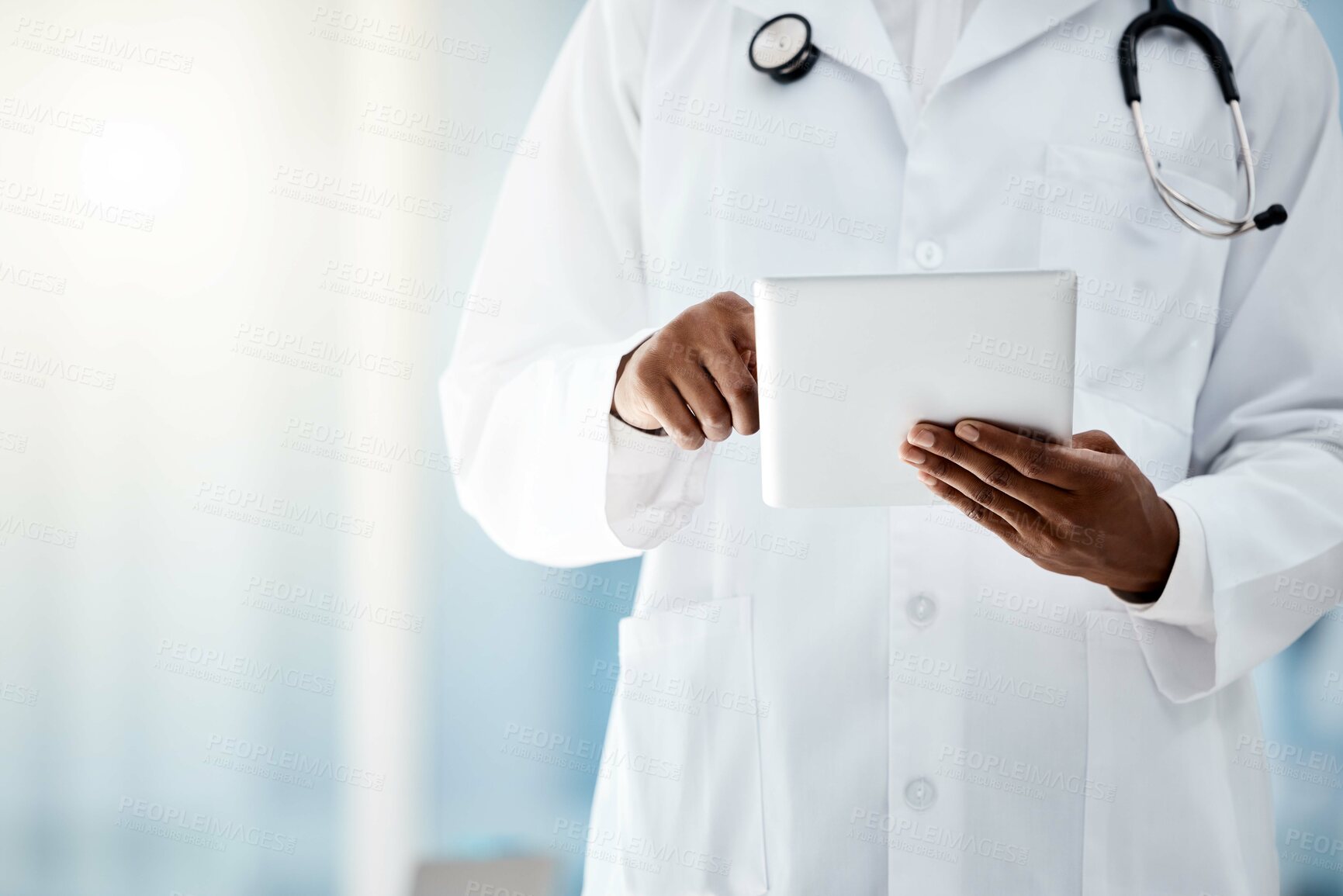 Buy stock photo Doctor, hands and tablet in hospital office for online consultation or telehealth app. Research, healthcare and black female physician on touchscreen tech, medical news or checking patient records.