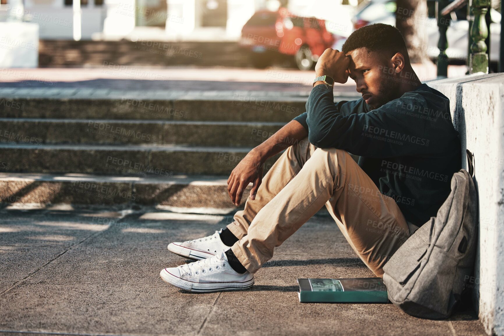 Buy stock photo Education, fail and stress with a black man student worried about an exam or test on university campus. College, sad and scholarship with a male pupil feeling depressed after a negative report