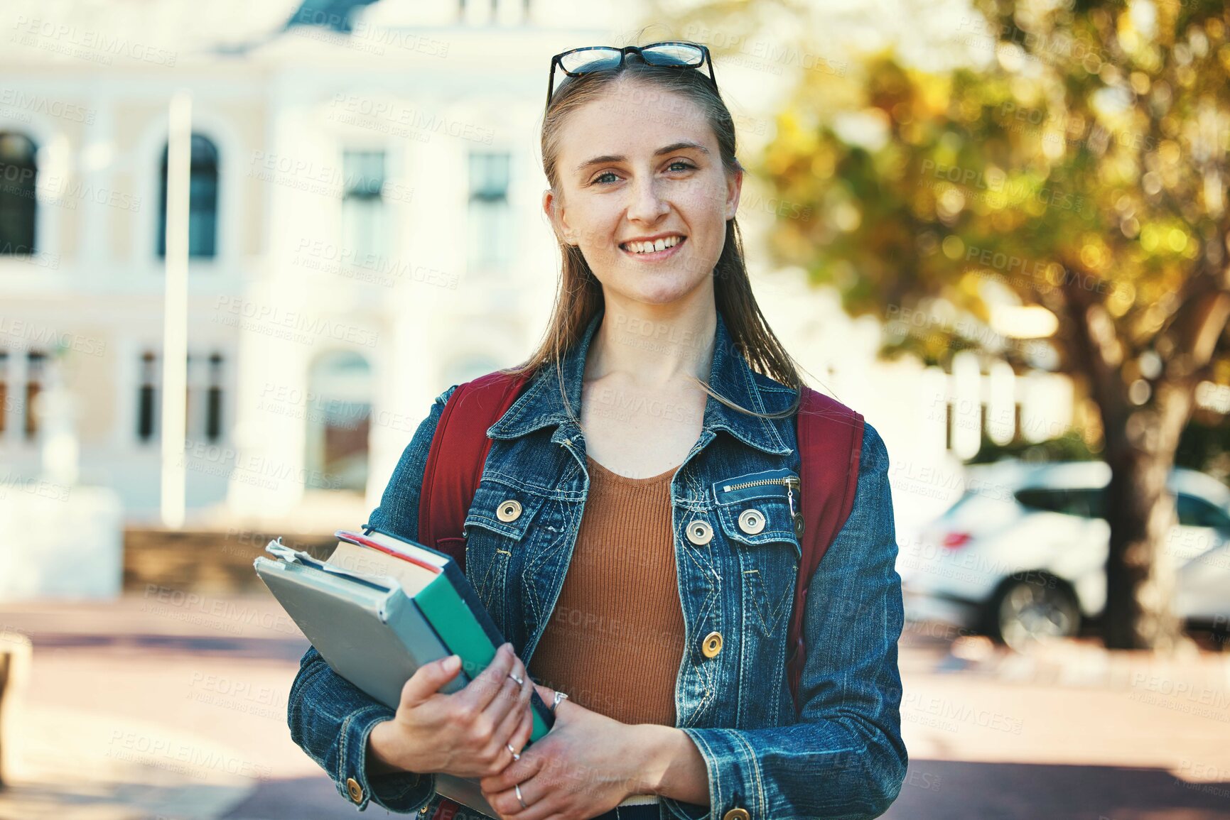 Buy stock photo Education, campus and college portrait of student with books, backpack and ready for back to school learning. Scholarship study, knowledge commitment and studying woman happy at university building