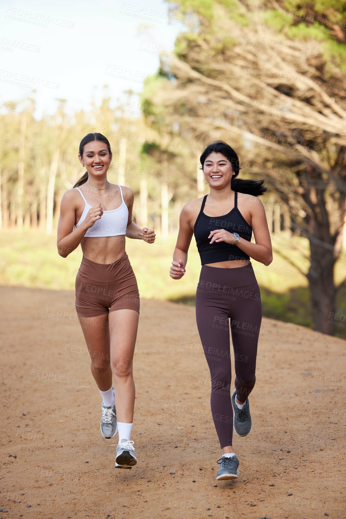 Buy stock photo Fitness women or friends running in nature, forest or park for workout, exercise and cardio training together. Diversity athlete, sports or runner people outdoor jogging for body health and wellness