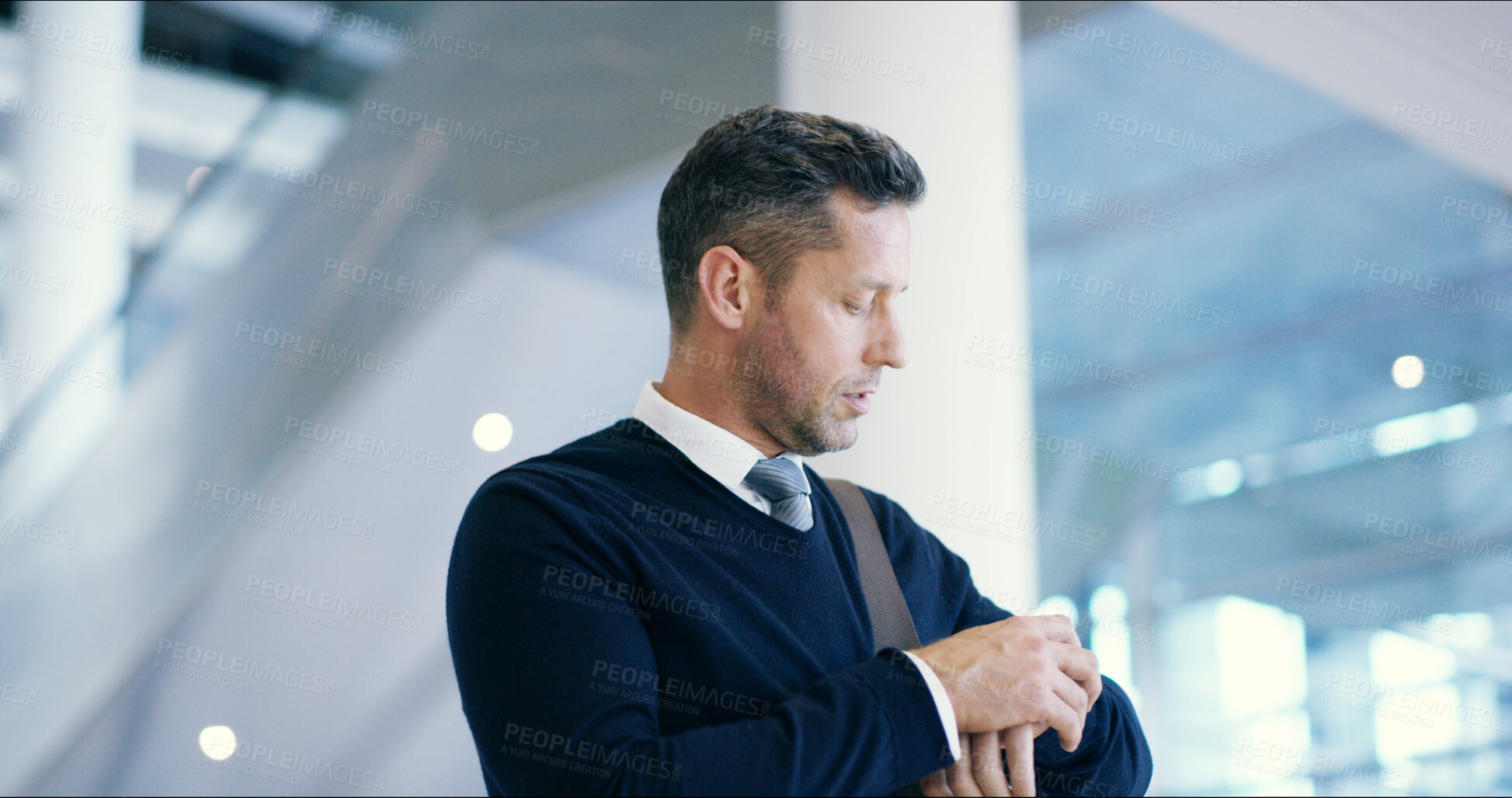 Buy stock photo Man, checking and wrist watch for time management, business meeting and career at law firm. Male person, travel and punctual with schedule as attorney for deadline, running late and waiting in office