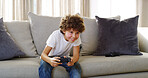 Gaming, home and child with controller, smile and playing with subscription in living room and gamer. Happy, boy and fun with tech in lounge, relax and kid with console, joy and online in house