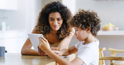 Buy stock photo Woman, tablet and child for education, elearning and studying for future and knowledge. Mother, student and kitchen for teaching, homework or support for home school or development with assessment