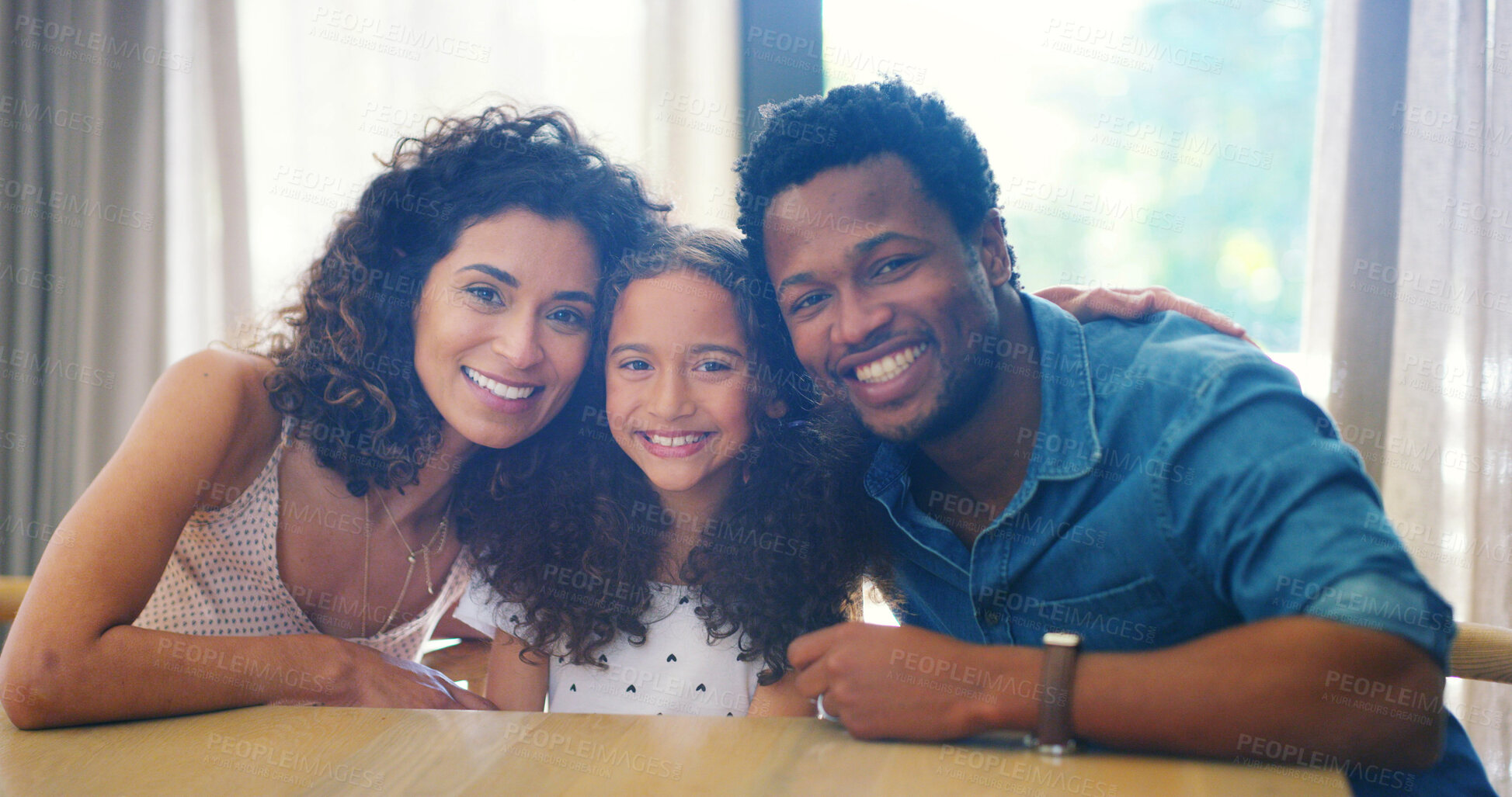 Buy stock photo Interracial parents, girl and portrait in home with hug, smile and care with diversity or happy family. Father, mother and daughter with embrace, connection and love in living room for bonding