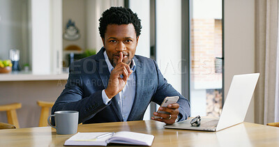 Buy stock photo Hush, laptop and portrait of business black man in home with phone for corruption, embezzlement or fraud. Computer, crime and theft with finger on lips of remote work employee for secret in apartment