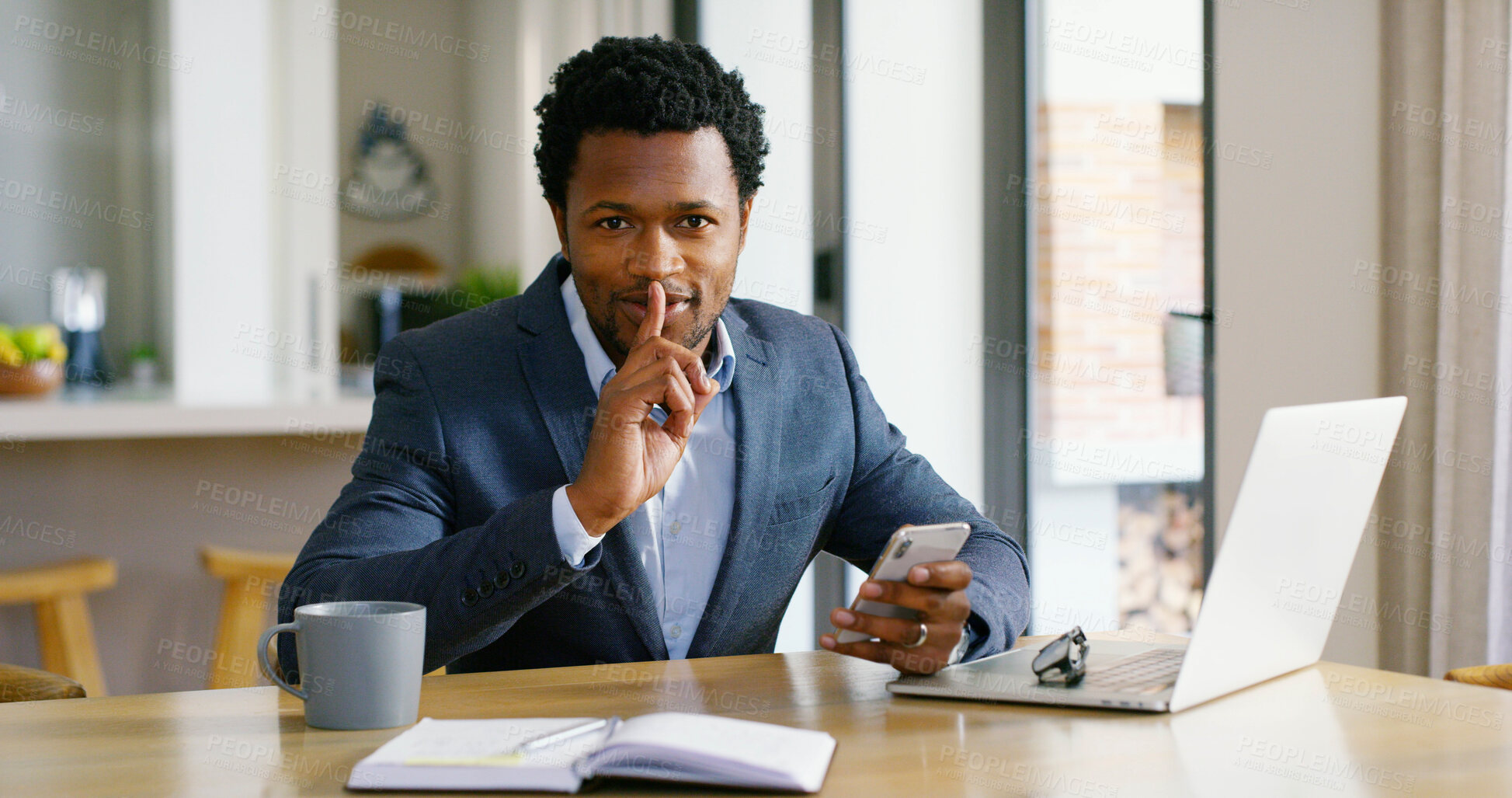 Buy stock photo Hush, laptop and portrait of business black man in home with phone for corruption, embezzlement or fraud. Computer, crime and theft with finger on lips of remote work employee for secret in apartment