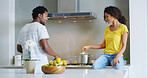 Happy couple, kitchen and cooking for lunch, bonding together or meal prep with love or wellness. Woman, man and romance in home for affection, support or care in relationship as partner in apartment