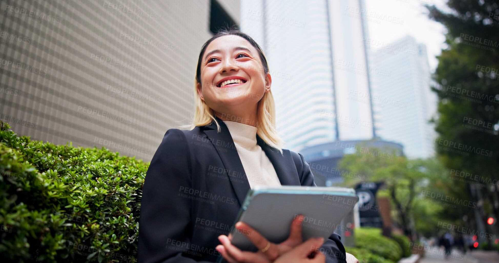 Buy stock photo Tablet, city and Japanese woman with thinking, morning and tech of lawyer below. Smile, digital and happy employee for urban commute to work with technology, travel and trip in Tokyo with idea