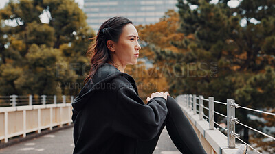 Buy stock photo Woman, running and warm up legs for fitness in city, stretching muscle and outdoor for thinking. Female person, urban park and reflection on exercise preparation, getting ready and workout in Japan