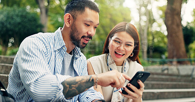 Buy stock photo Couple, smartphone and happy on travel at park on stairs, click and excited for discount on hotel booking. People, man and woman with phone, mobile app and notification on social network in Japan