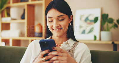 Buy stock photo Relax, phone and smile with woman on sofa for streaming, social media and networking app. Connection, online news and internet with person in living room at home for mobile, web and communication 
