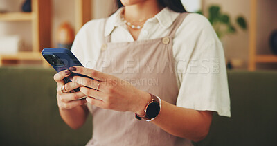 Buy stock photo Relax, phone and hands with woman on sofa for streaming, social media and networking app. Connection, online news and internet with closeup of person in living room at home for mobile, web and typing