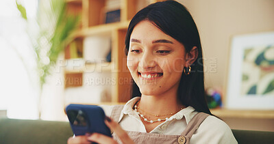 Buy stock photo Reading, phone and happy with woman on sofa for streaming, social media and networking app. Connection, online news and internet with person in living room at home for mobile, web and communication 