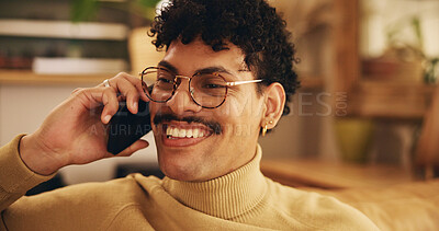 Buy stock photo Man, phone call and relax in home, smile and excited in living room, chat and laughing on sofa. Person, smartphone and funny conversation with contact, lounge and talk on mobile network at apartment