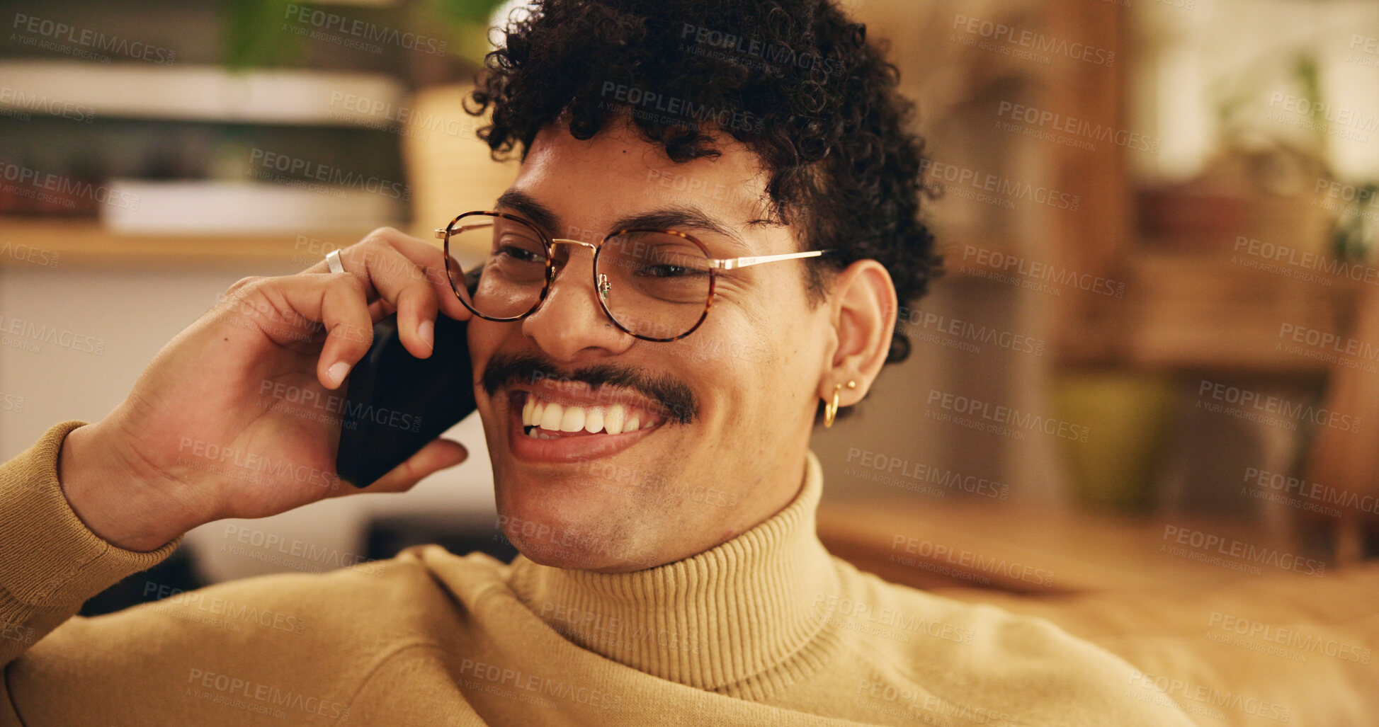 Buy stock photo Man, phone call and relax in home, smile and excited in living room, chat and laughing on sofa. Person, smartphone and funny conversation with contact, lounge and talk on mobile network at apartment
