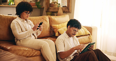 Buy stock photo House, smartphone and couple on couch, tablet and internet with connection. relax and social media. Apartment, people and man with woman, cellphone and technology with online reading and relationship