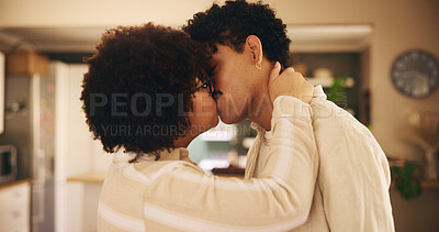 Buy stock photo Couple, bonding and kiss with hug, relationship and together in living room for affection in home. Woman, man and embrace as connection as romantic partner for love, happiness or support on honeymoon