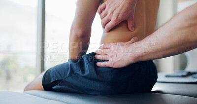 Buy stock photo Hands, back pain and injury for massage with physiotherapy at clinic with recovery, process and relief for legs. Person, patient and help for ache, spine and rehabilitation for wellness at hospital