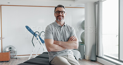 Buy stock photo Portrait, happy man and pride as physiotherapist in gym, rehabilitation clinic or wellness practice. Male person, confidence and arms crossed with smile, personal trainer or coach for physio exercise
