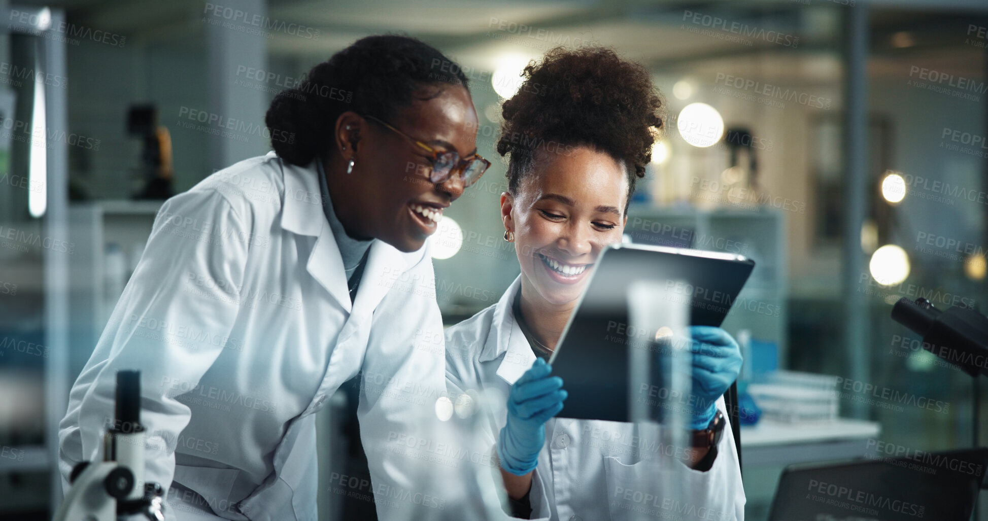 Buy stock photo Science, women or tablet in lab for feedback, positive advice or happy for medical innovation at night. Team, tech and smile in facility with scientific study, pharmaceutical breakthrough or deadline