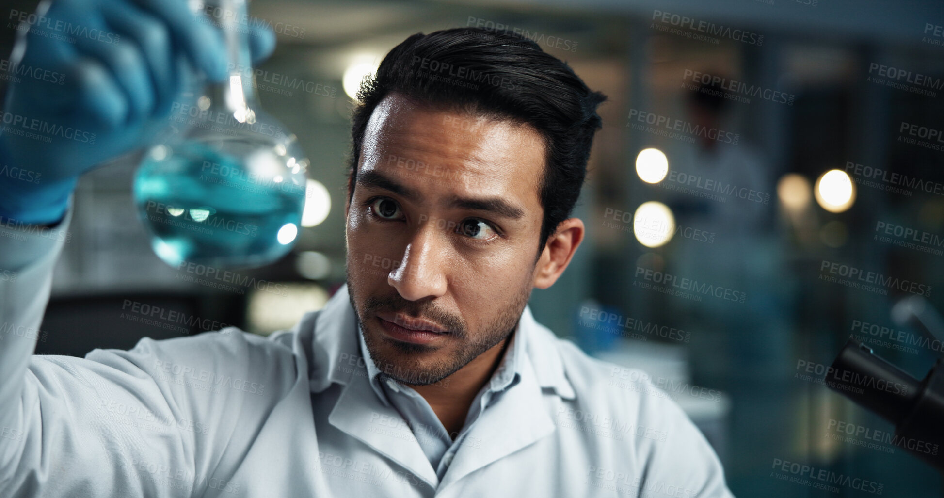 Buy stock photo Beaker, science and solution with man in laboratory at night for breakthrough, development or experiment. Chemical reaction, investigation and liquid with scientist at work for innovation or research