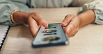 Phone, app and hands of woman with online order, shopping and digital scroll at desk. Mobile, ads and e commerce with web store, technology and internet search for product purchase on screen