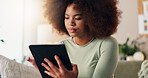 Tablet, home and African woman with social media, scroll and student reading online article for college. Digital, internet and  internet search with blog app, technology and living room with email