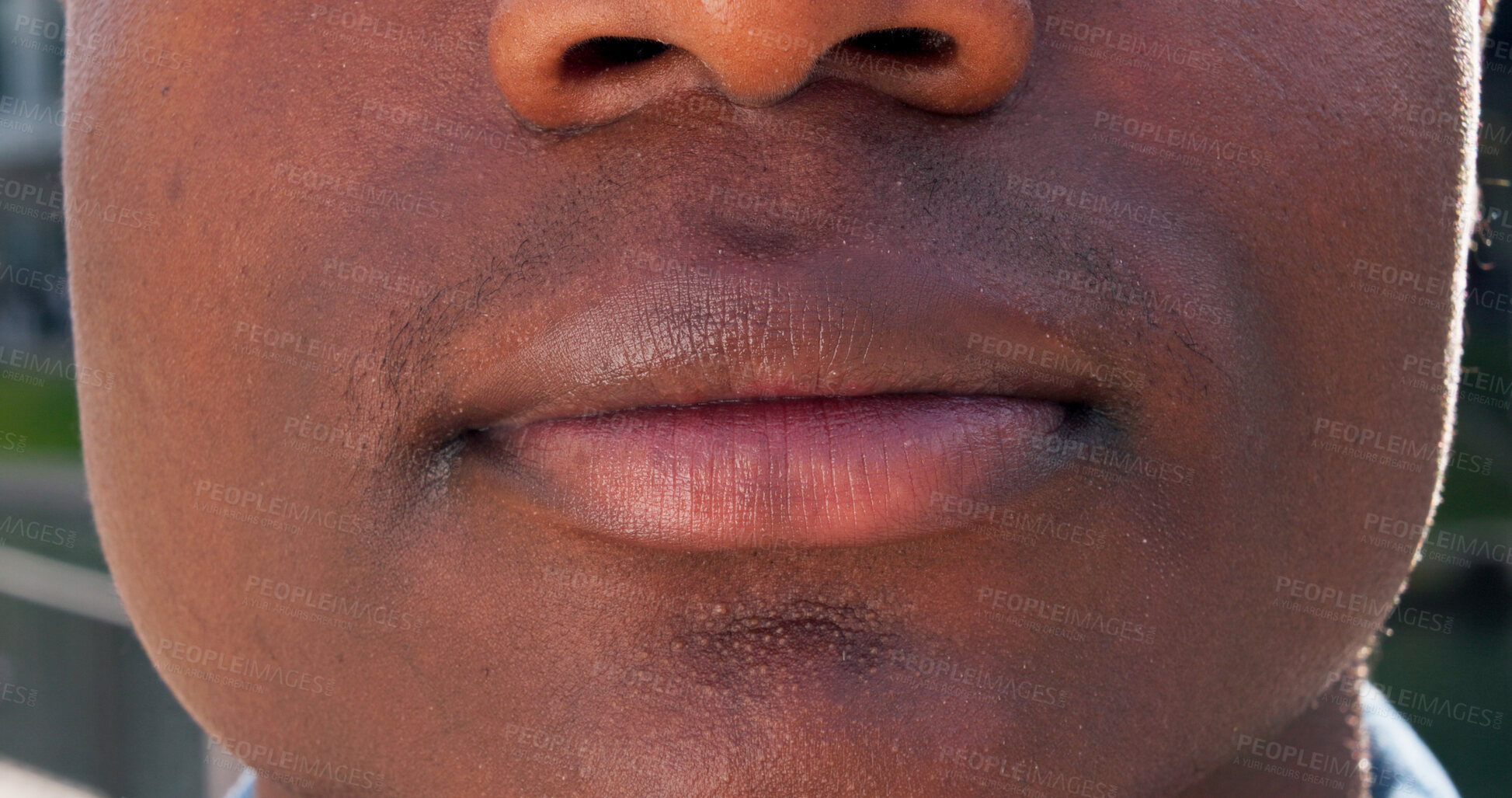 Buy stock photo Closeup, mouth and man in city, skincare and confidence with smooth skin. Outdoor, person and guy with lips, cosmetics or wellness with dermatology, grooming or treatment with glow or Nigeria