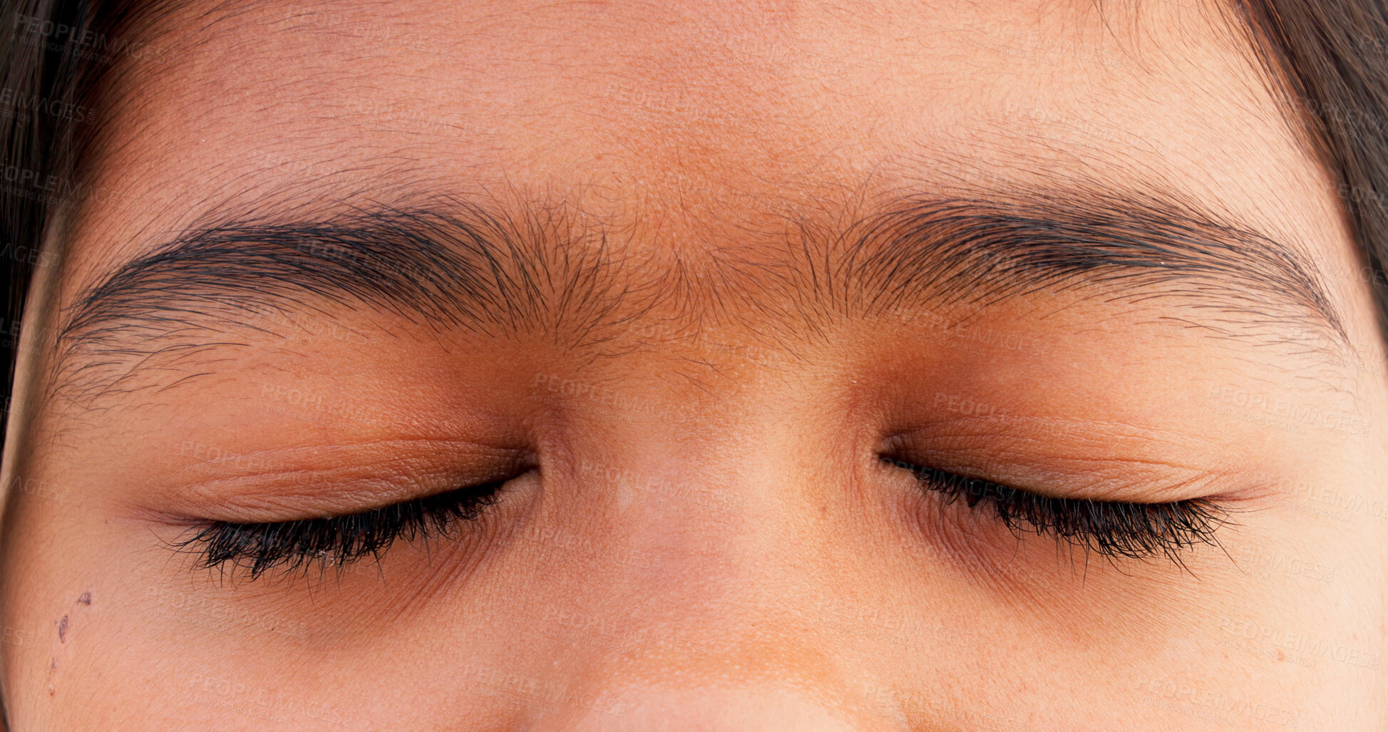 Buy stock photo Eyes closed, zoom and child in optometry, optic care and stress relief for vision, wellness and zen. Person, face and ophthalmology for eyesight, health and peace as young girl for relax or awareness